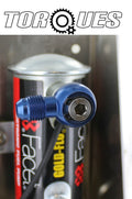 An -6 (jic6) to 1/4" Npt Banjo Assembly for Facet Red / Blue Top Fuel
